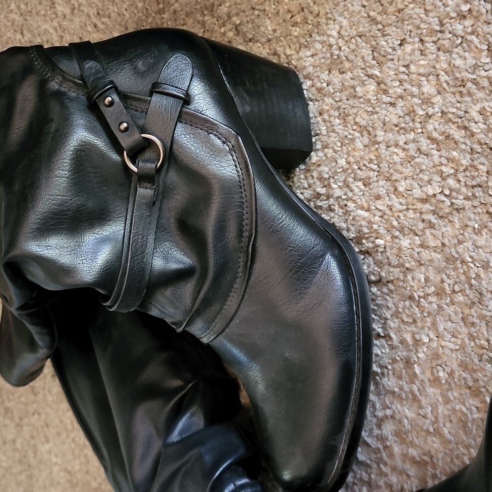 Tall black boots
